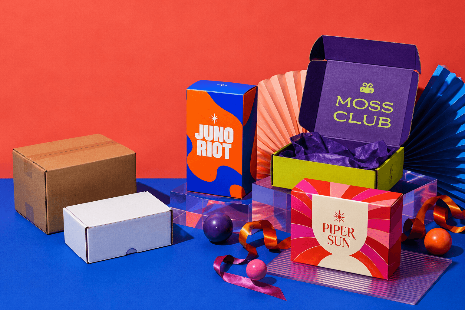 Custom printed branded boxes beside plain stock boxes showing the difference in fit, presentation and branding.