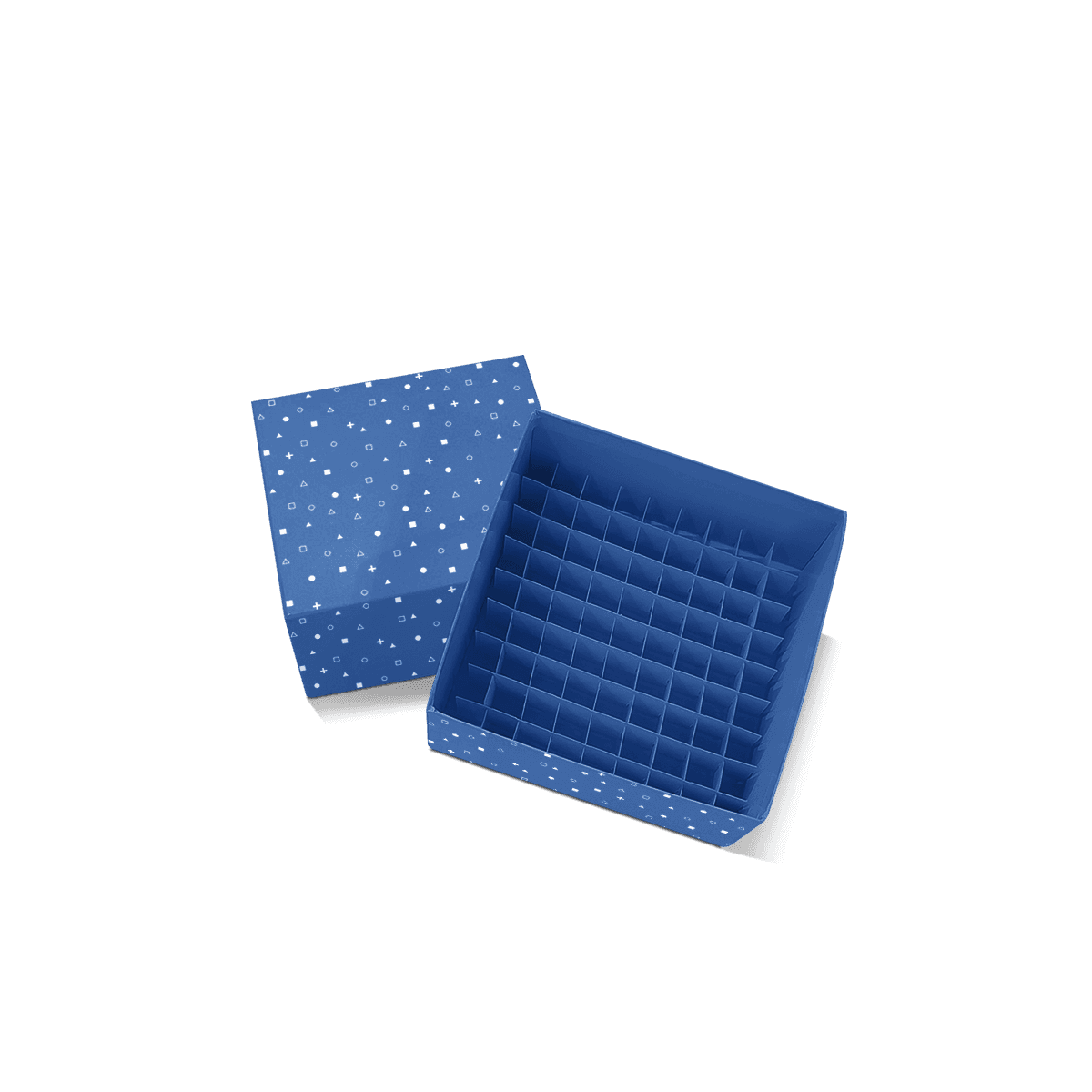 Cell dividers with grid-style cardboard compartments, arranged inside a box to separate small products and prevent contact during handling.